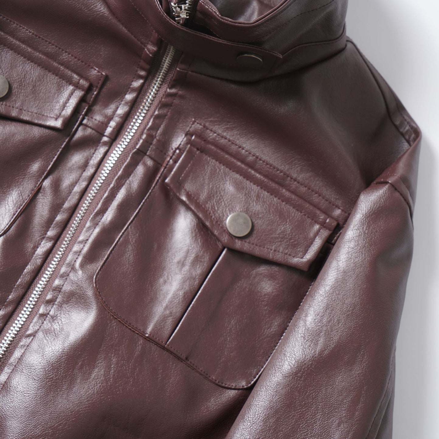 Maillard wearing stand up collar leather jacket for women